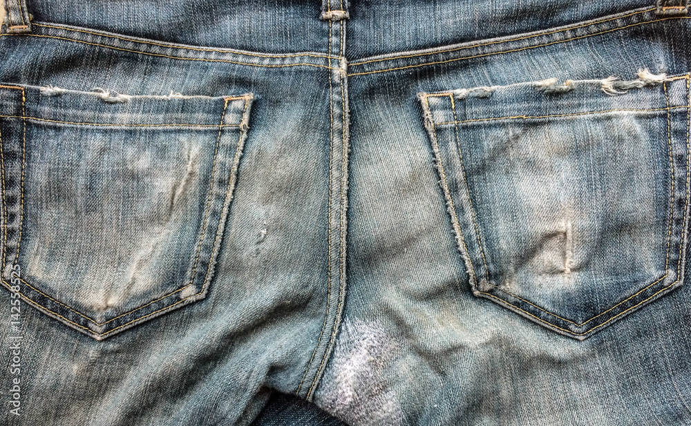 Denim jeans texture or denim jeans background with old torn. Old grunge vintage denim jeans fashion design. 