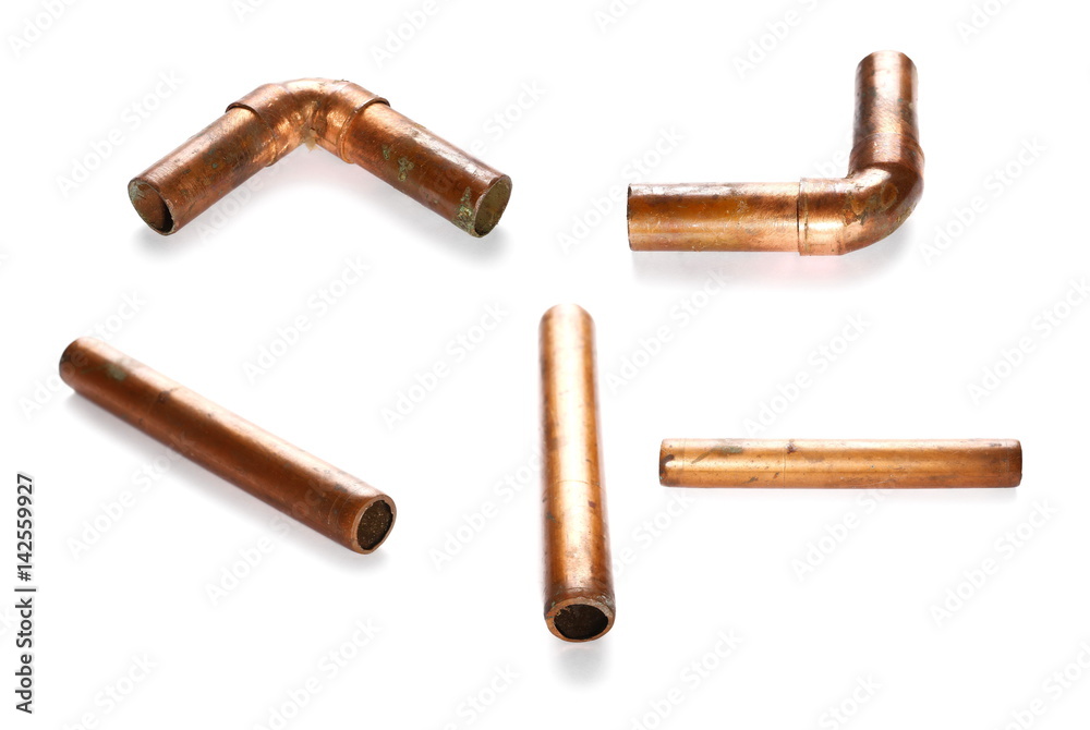 Rusty old copper pipe set, collection for heating, isolated on white background Rusty old copper pipe set, collection for heating, isolated on white background