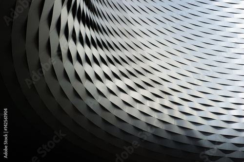 abstract metallic structure with repetitive pattern background  photo