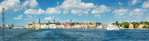 View to Stockholm, Sweden with a ferry from sea in summer. Gamla Stan on sunny day