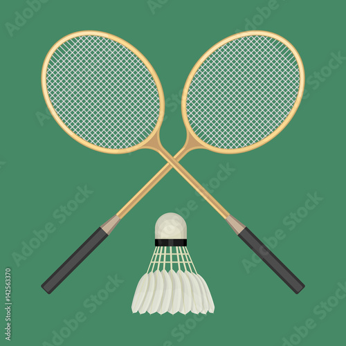 Two crossed badminton rackets and white shuttlecock with black line.
