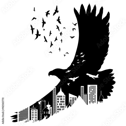 Vector silhouette flying eagle with double exposure effect. Urban city as background.