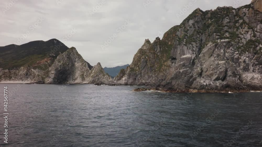 South-eastern coast of Kamchatka peninsula in southwestern part of Avacha Gulf of Pacific ocean stock footage video South-eastern coast of Kamchatka peninsula in southwestern part of Avacha Gulf of Pacific ocean stock footage video