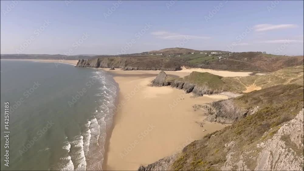 Three Cliffs Bay on the Gower peninsula in UK. Three Cliffs Bay on the Gower peninsula in UK.