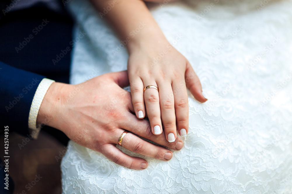 bride hands with wedding rings, close-up bride hands with wedding rings, close-up