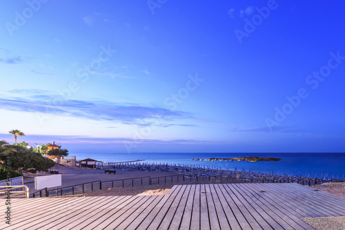 Evening view on sea and the beach with boats, protaras, cyprus island