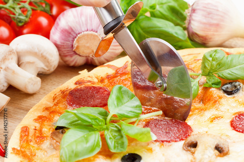 Hot pizza with cheese on a ...