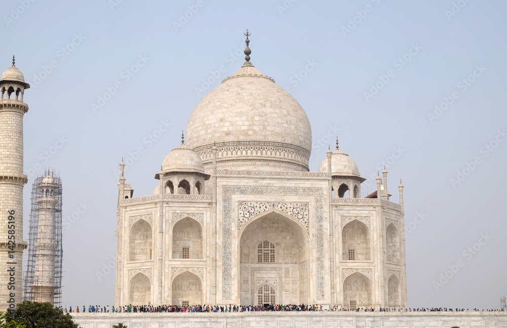 Taj Mahal (Crown of Palaces), an ivory-white marble mausoleum on the south bank of the Yamuna river in Agra, Uttar Pradesh, India 