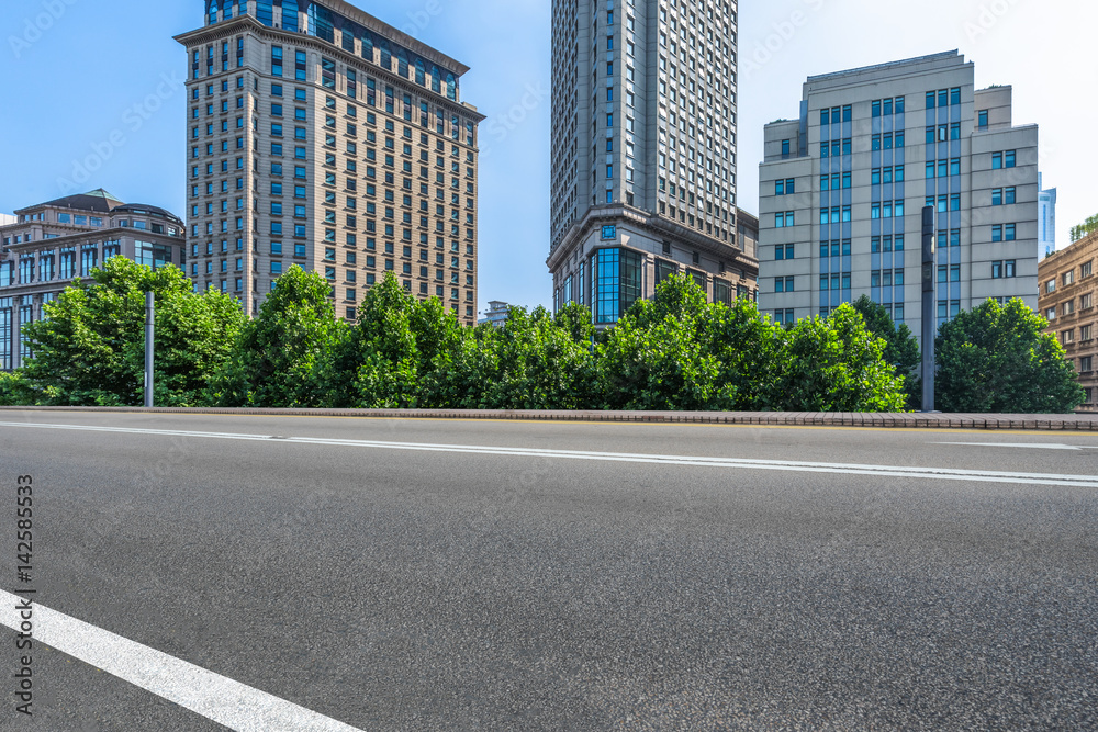 empty asphalt road front of modern buildings empty asphalt road front of modern buildings