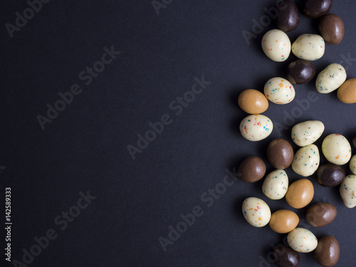 Chocolate easter eggs isolated on black background