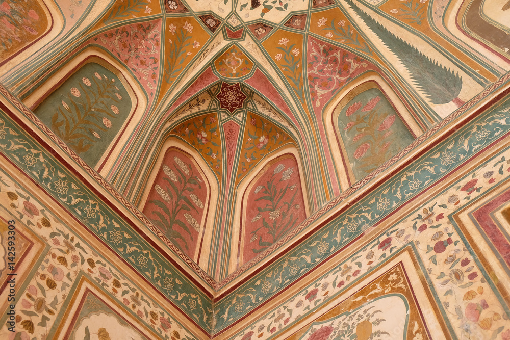 Beatiful ornament on wall of palace in Amber Fort in Jaipur, Rajasthan, India