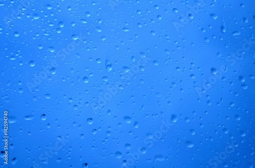 Background of water drops on a window glass