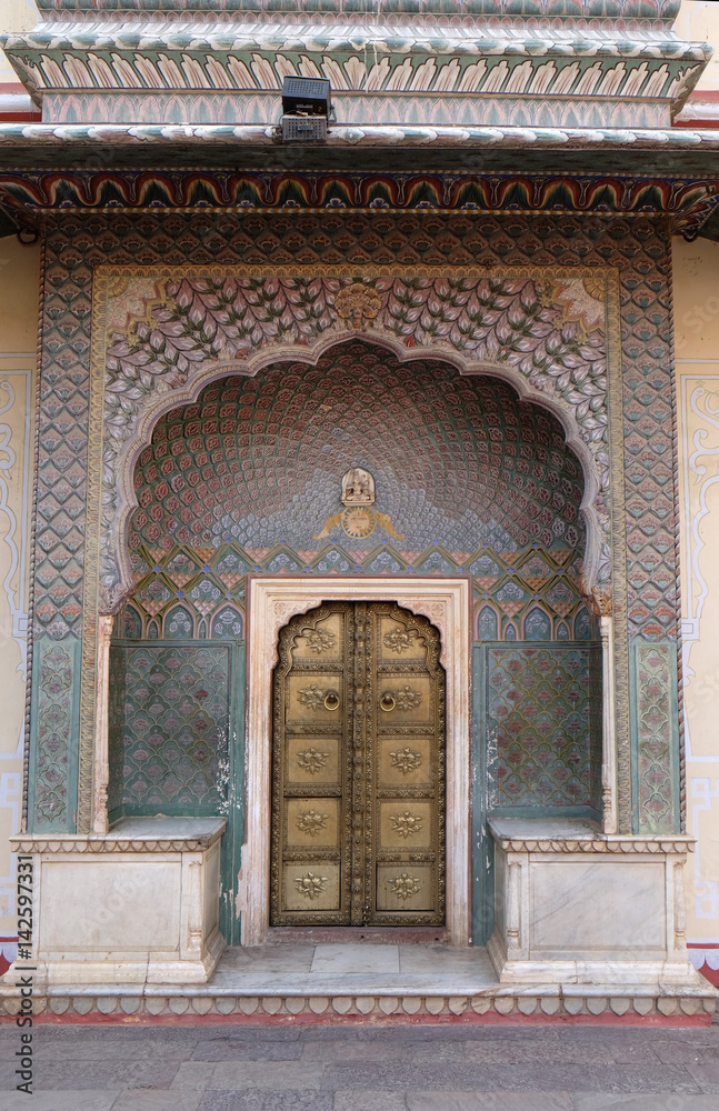 Ornate door at the Chandra Mahal, Jaipur City Palace in Jaipur, Rajasthan, India