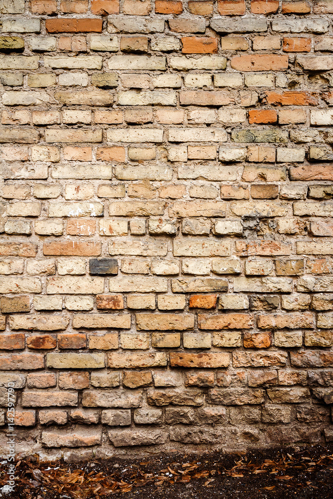 Yellow brick wall background Yellow brick wall background