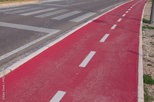 Red bicycle path © Kalnenko