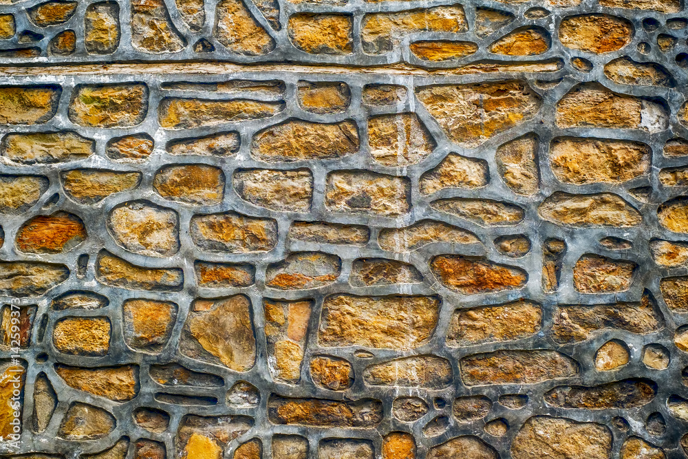 Stone wall with cemented joints