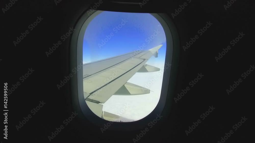 airplane porthole view into open space sky airplane porthole view into open space sky