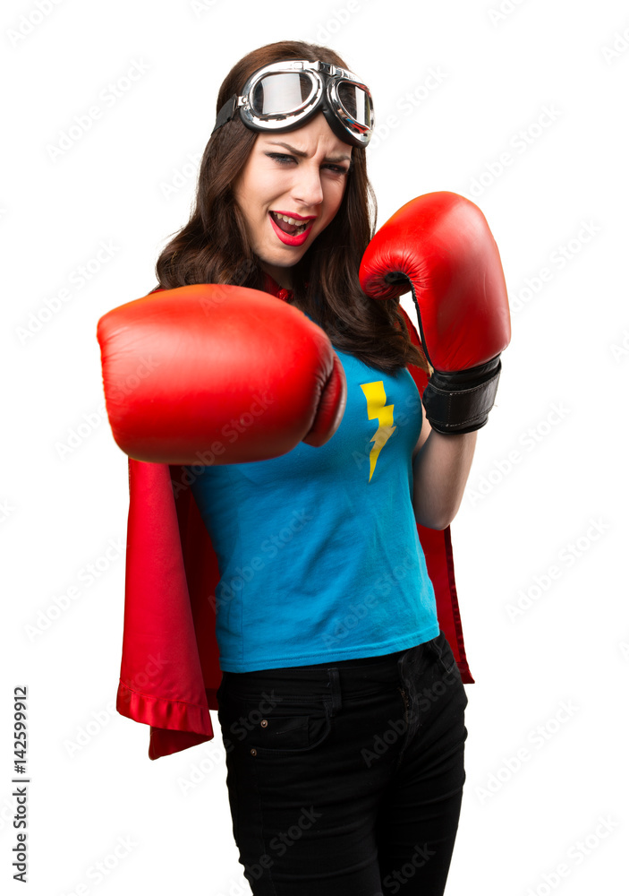 Pretty superhero girl with boxing gloves Pretty superhero girl with boxing gloves