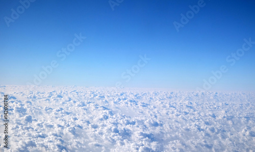 Skyline View above the Clouds from air plane © zatletic