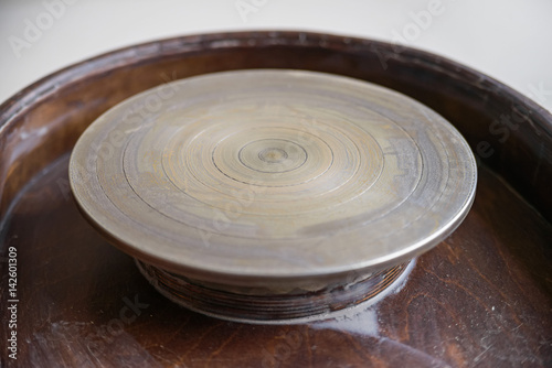 Close up of empty pottery wheel photo