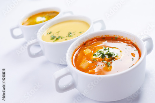 soup in the white cups