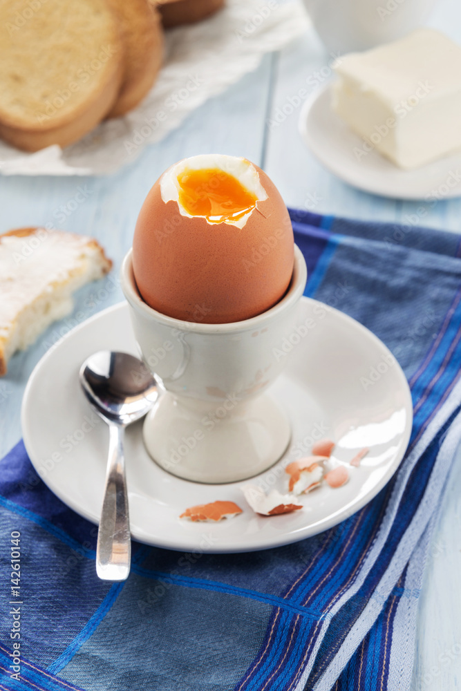 Soft-boilled egg in an egg-cup Soft-boilled egg in an egg-cup