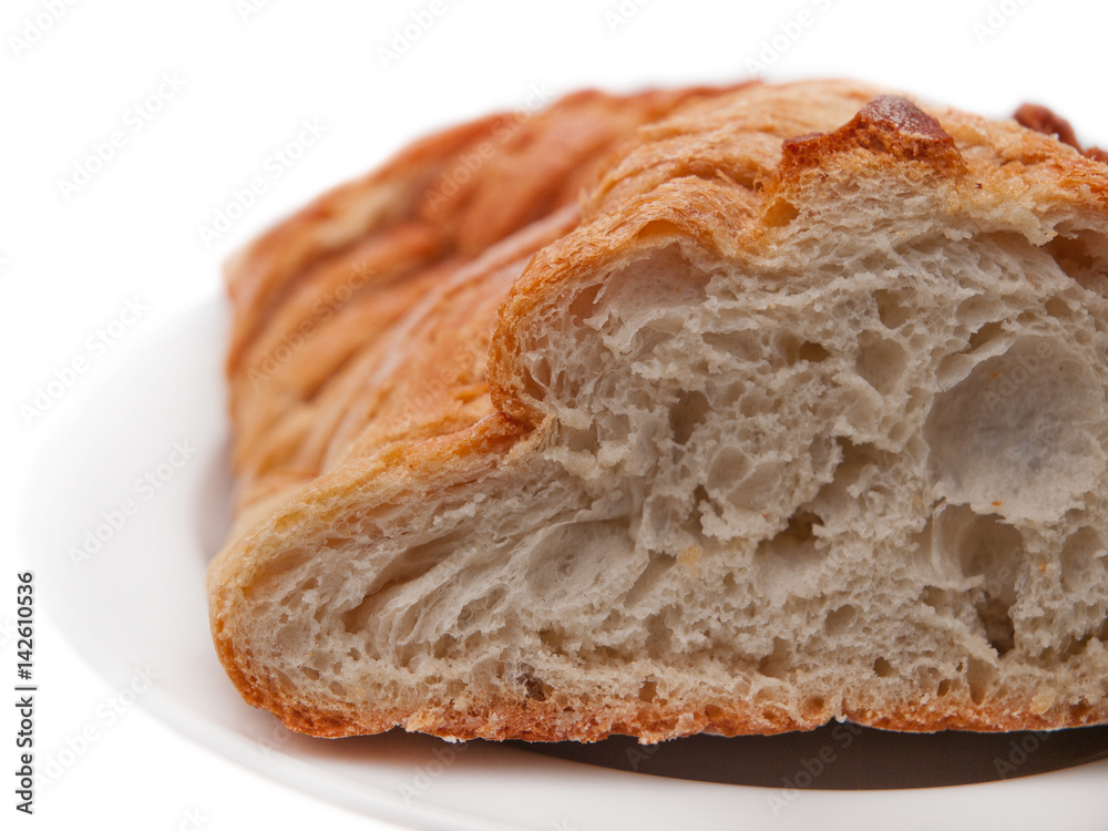 sliced loaf of white french country bread