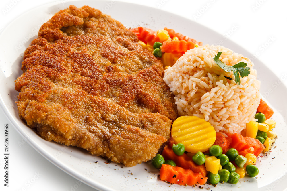 Fried pork chop with rice and vegetables Fried pork chop with rice and vegetables