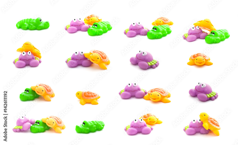 Collage of bath toys crab, crocodile and turtle isolated on a white background