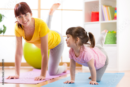 Mother and daughter doing f...