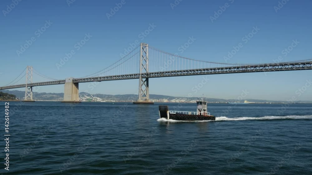 Ship at the Oakland Bay Bridge in San Francisco Ship at the Oakland Bay Bridge in San Francisco