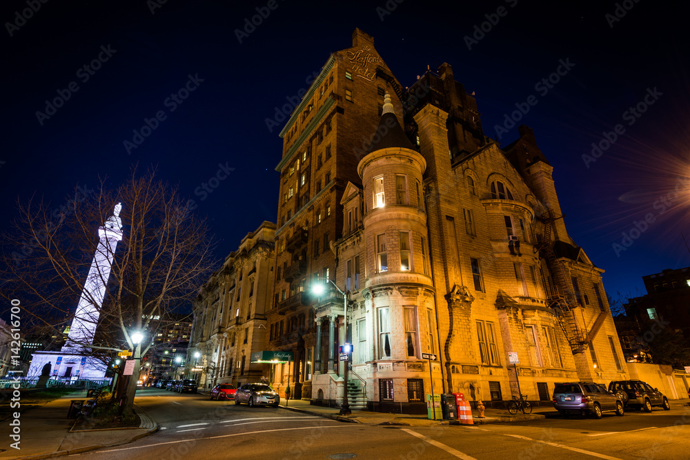 Historic buildings on Madison Street at night, in Mount Vernon, Baltimore, Maryland.