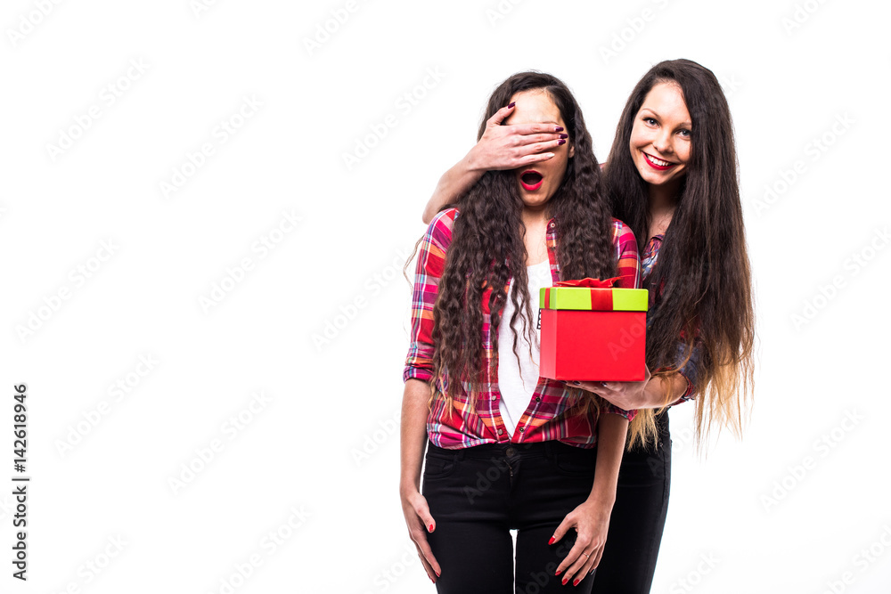 Twins sister get a present on white background