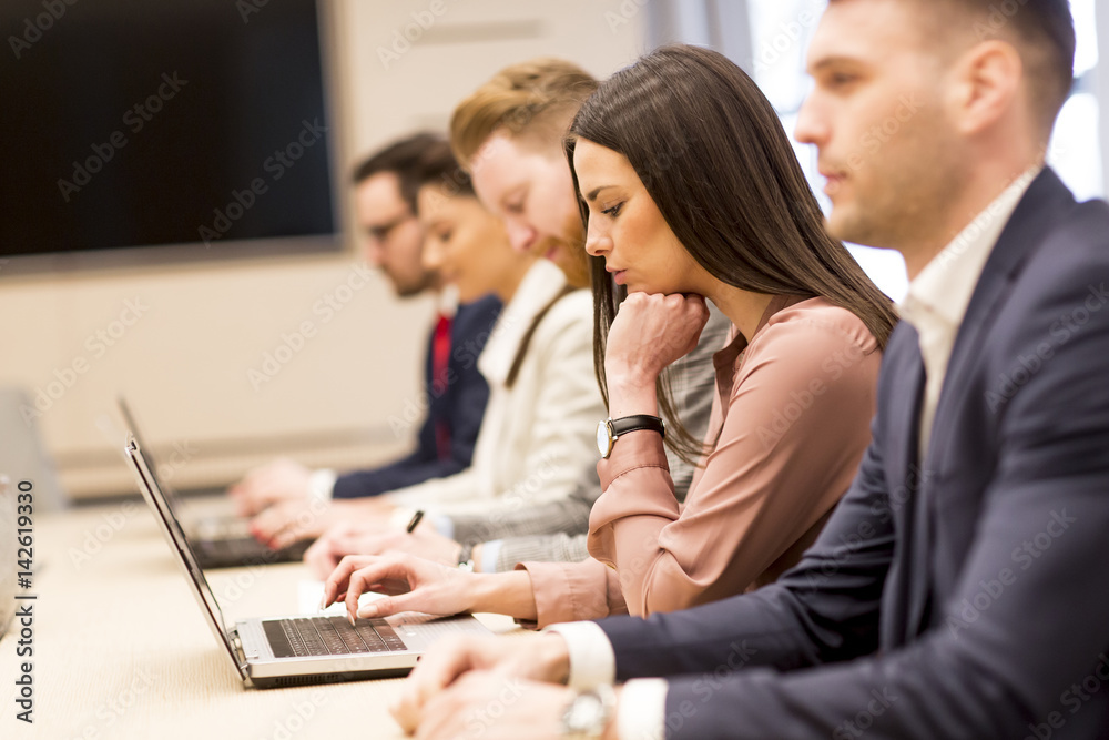 Business people working in modern office Business people working in modern office
