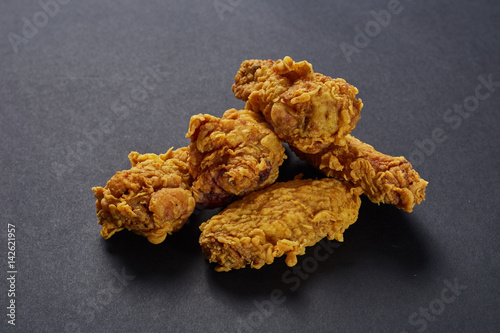 crispy kentucky fried chicken in beauty black background