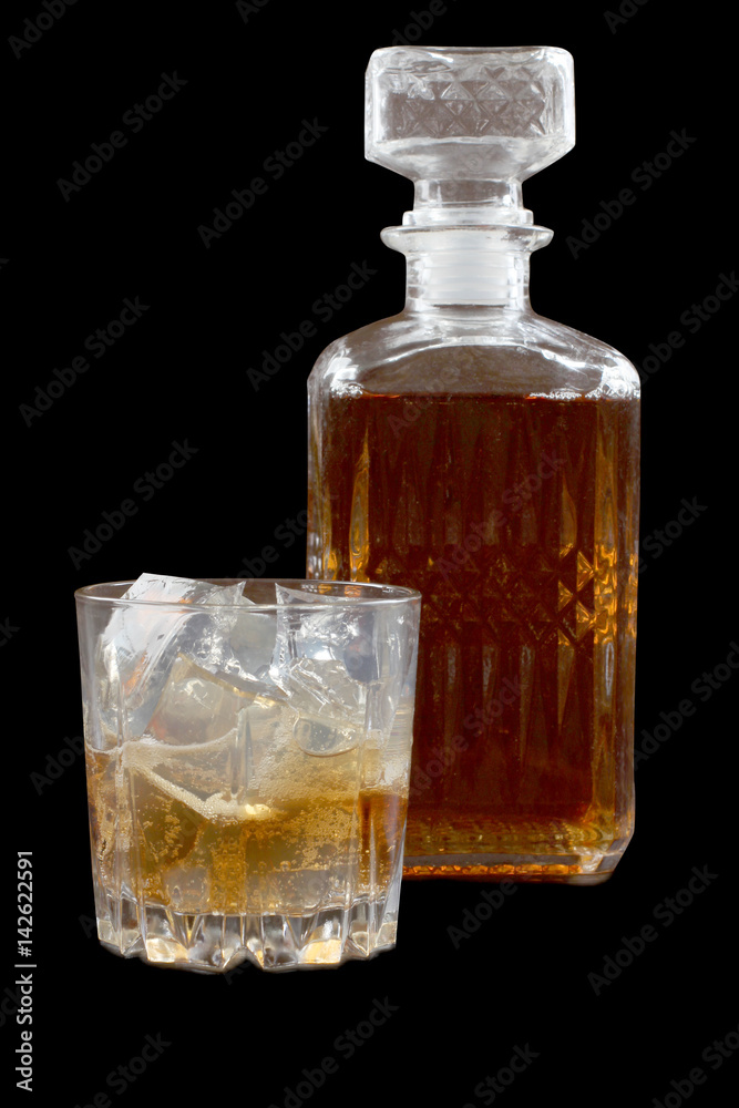 Glass and bottle whiskey on wooden table Glass and bottle whiskey on wooden table