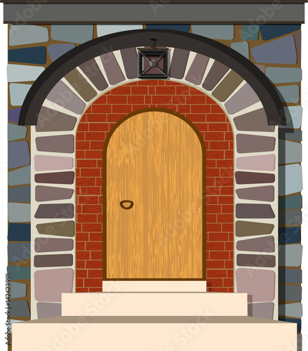 Old wooden vintage door with stone arch isolated.