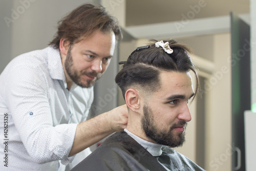 At the barber saloon