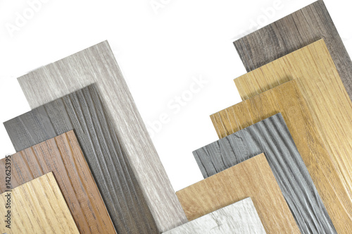 wood texture floor Samples of laminate and vinyl floor tile on wooden Background for new constuction or renovate building