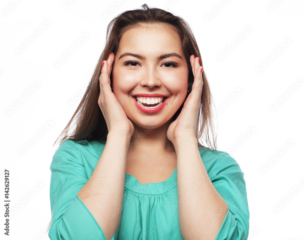Beautiful young surprised woman. Studio shot. Beautiful young surprised woman. Studio shot.