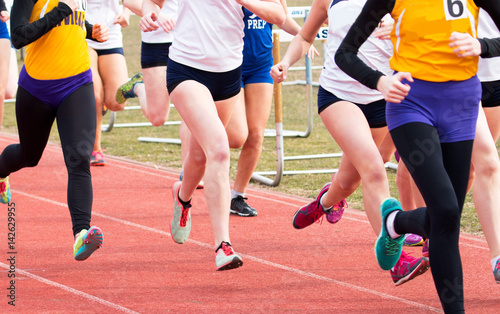 High School Girls racing on a track