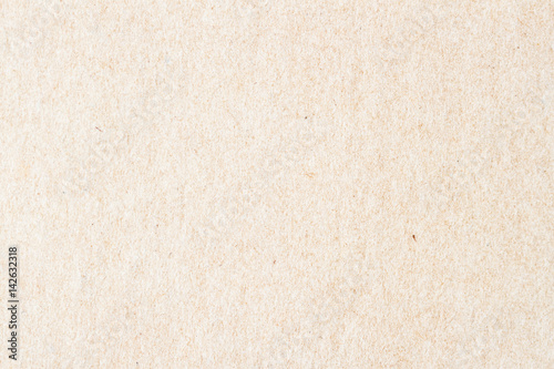 Texture of old organic light cream paper. Recyclable material with small inclusions of cellulose. Background , backdrop, substrate, composition use for design