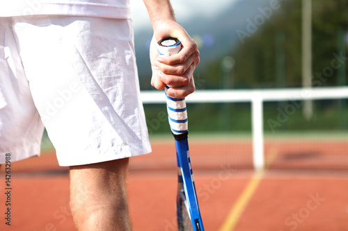 Принти на полотні tennis player with racket during a match game