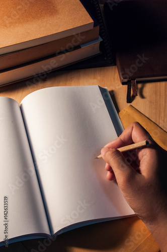 writing blank book template on the table