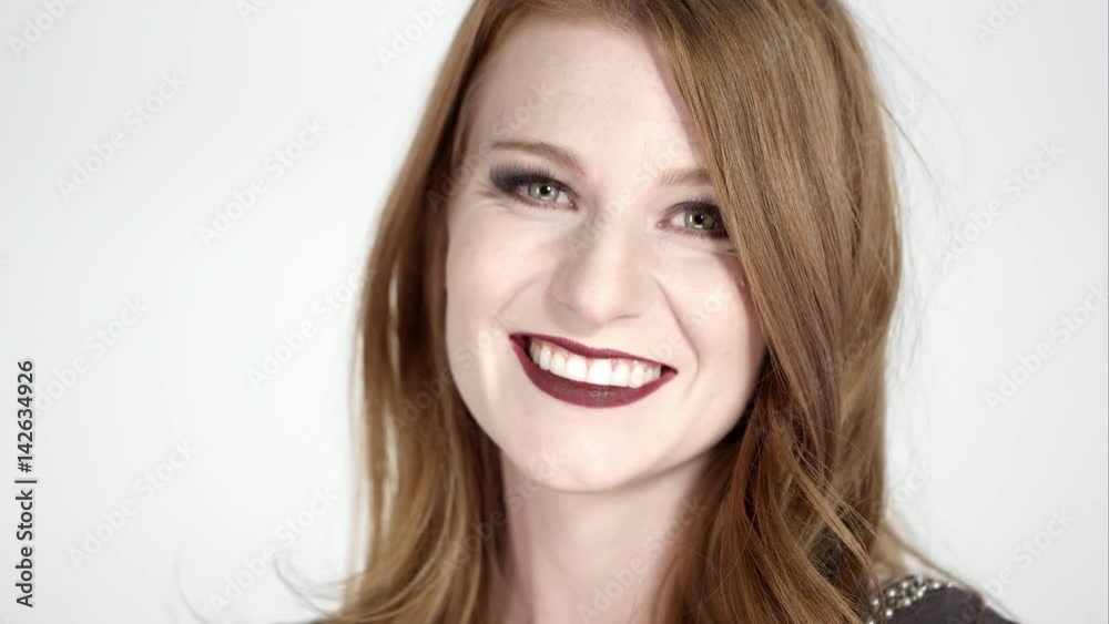 Red head girl on white screen Red head girl on white screen