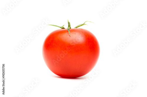 one fresh red tomato isolated on white