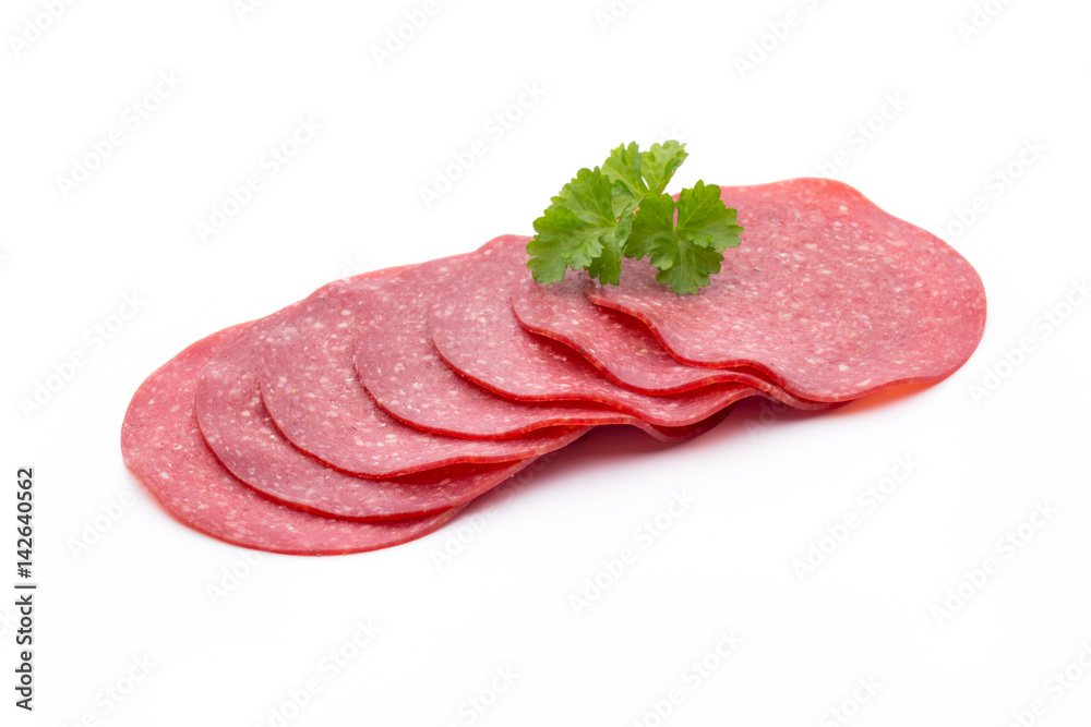 Salami smoked sausage one slice isolated on white background cutout. Salami smoked sausage one slice isolated on white background cutout.