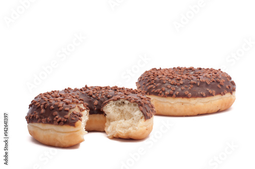 Two chocolate donut is broken half