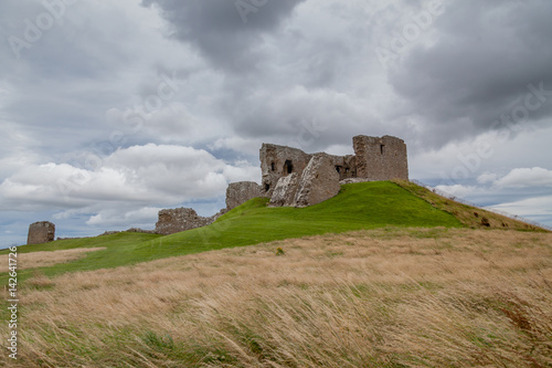 Duffus castle with cloudy sky