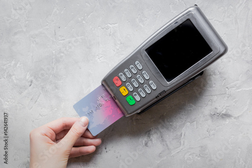 Wallpaper Mural payment with credit card through terminal on stone background top view mock-up Torontodigital.ca